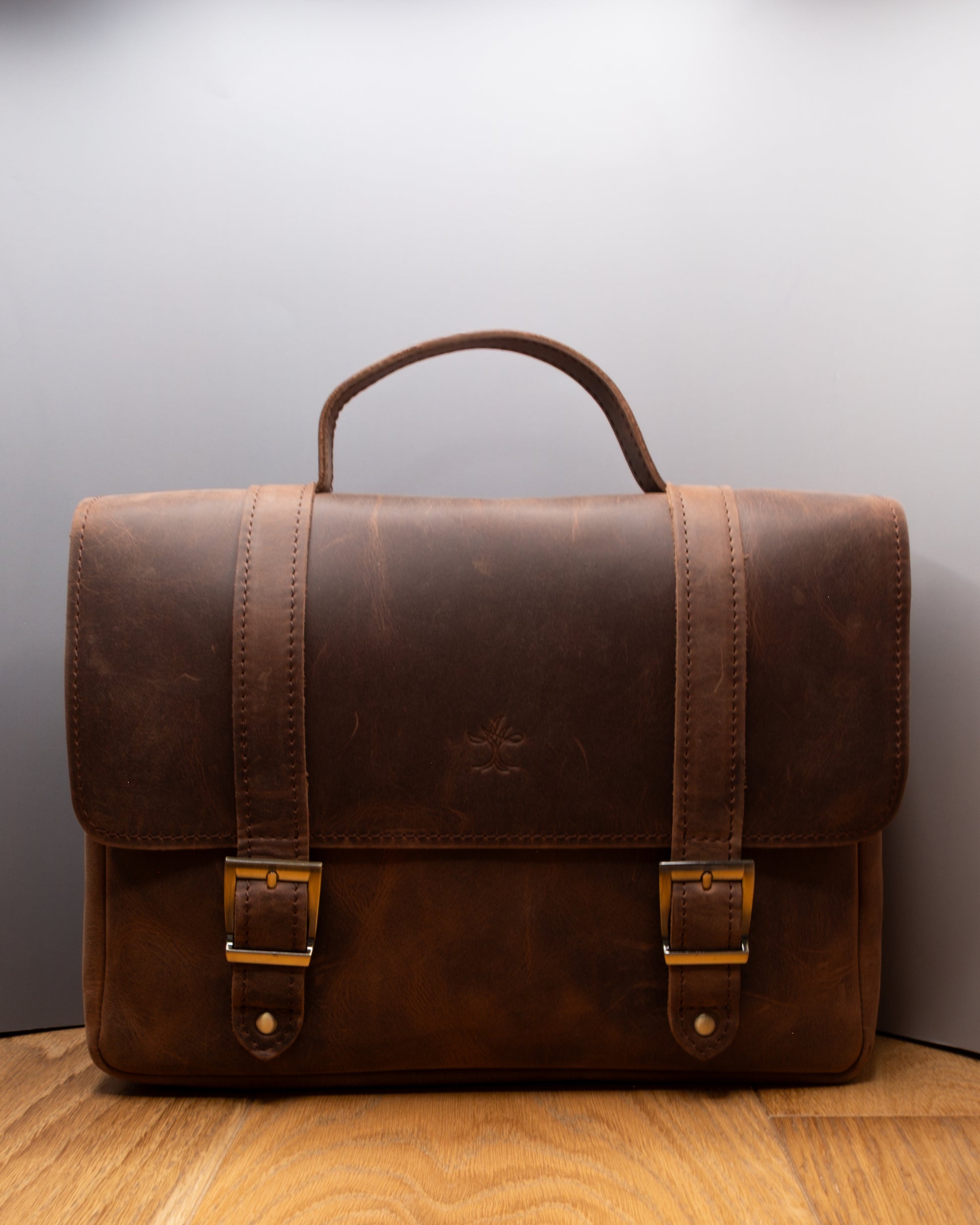 Postman Bag handcrafted from brown Top Grain Crazy Leather, front view